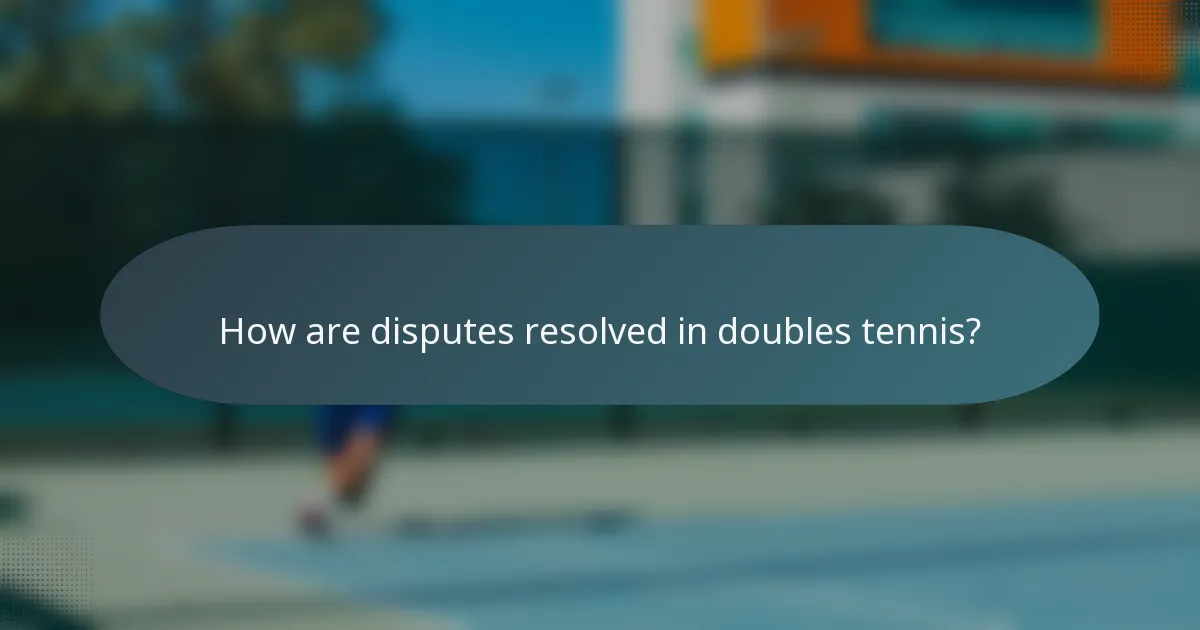 How are disputes resolved in doubles tennis?