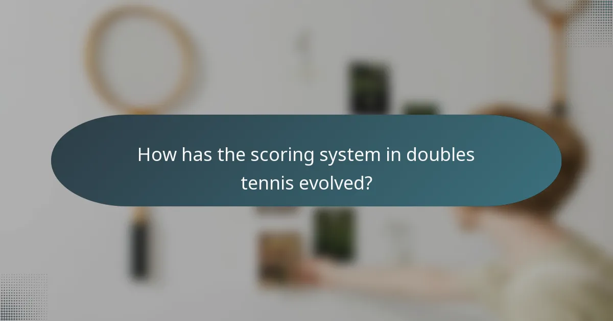 How has the scoring system in doubles tennis evolved?