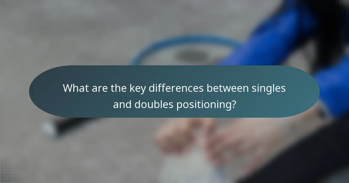 What are the key differences between singles and doubles positioning?
